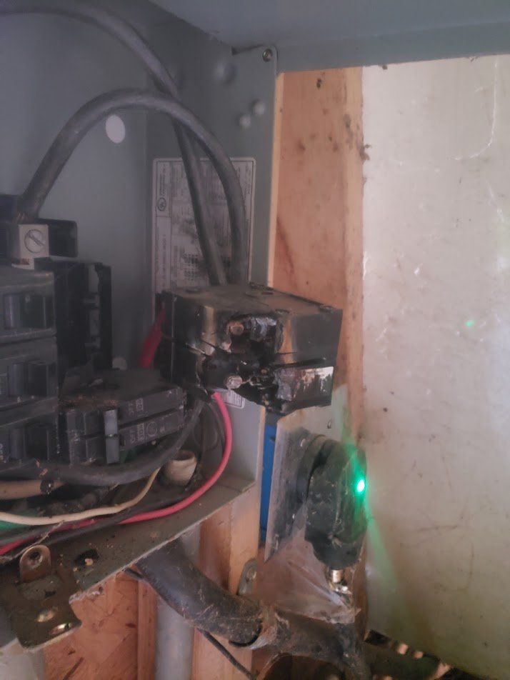 Melted, burned breaker inside an old subpanel